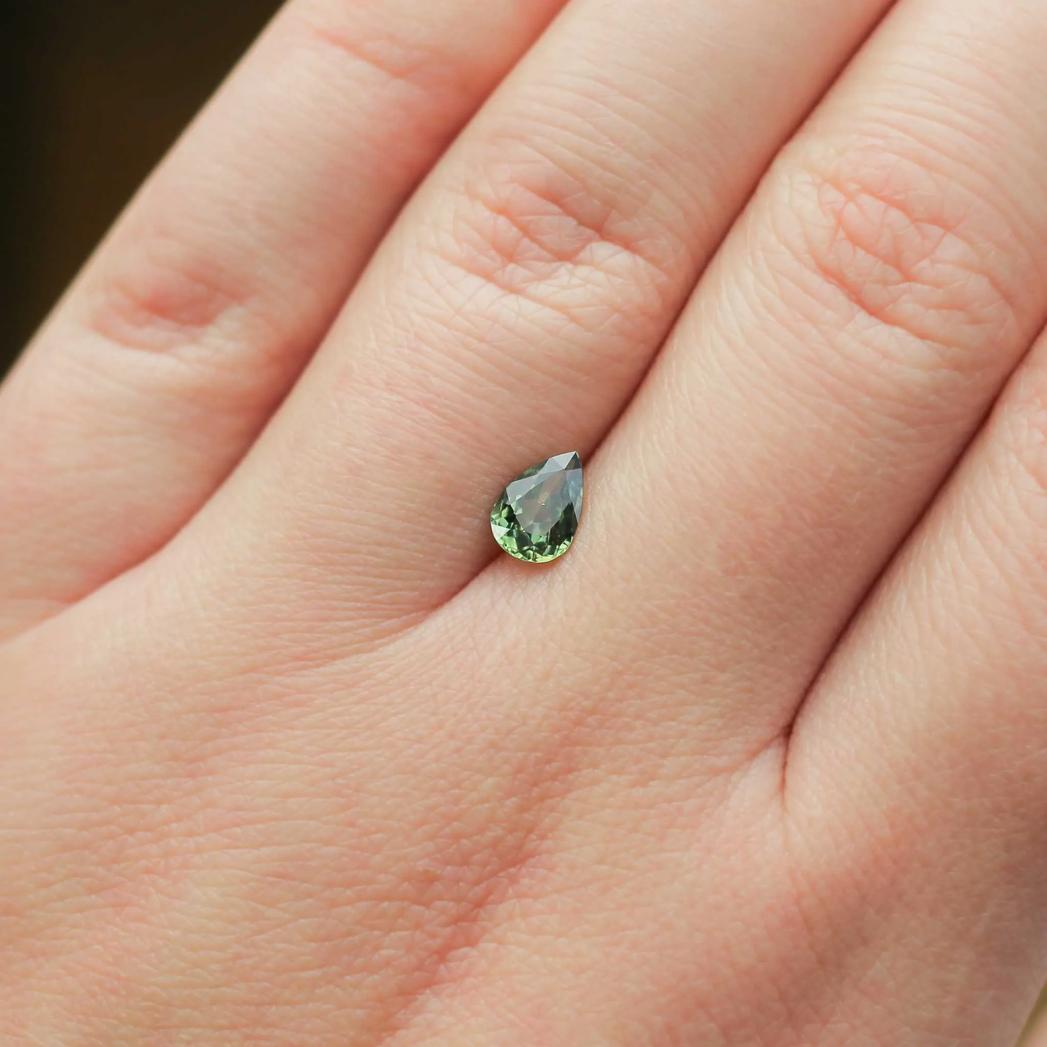 0.82 carat pear-shaped green sapphire