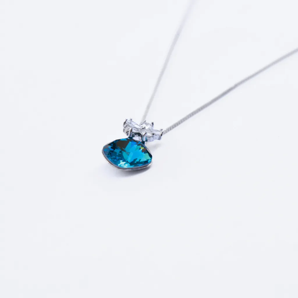 Aquamarine crystal necklace with platinum plated zirconia flower.