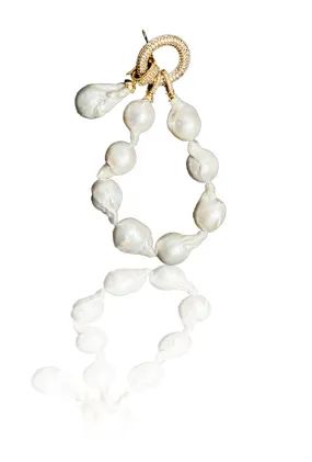 Baroque Pearl Bracelet with Pendant can be rewritten as Pearl Bracelet with Baroque Pendant.