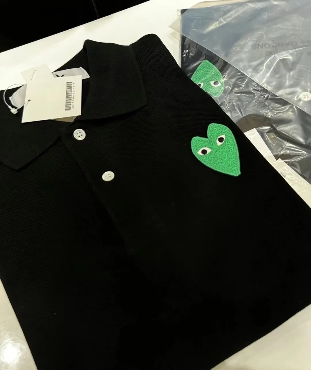 COMME des GARCONS  |Designers Polos