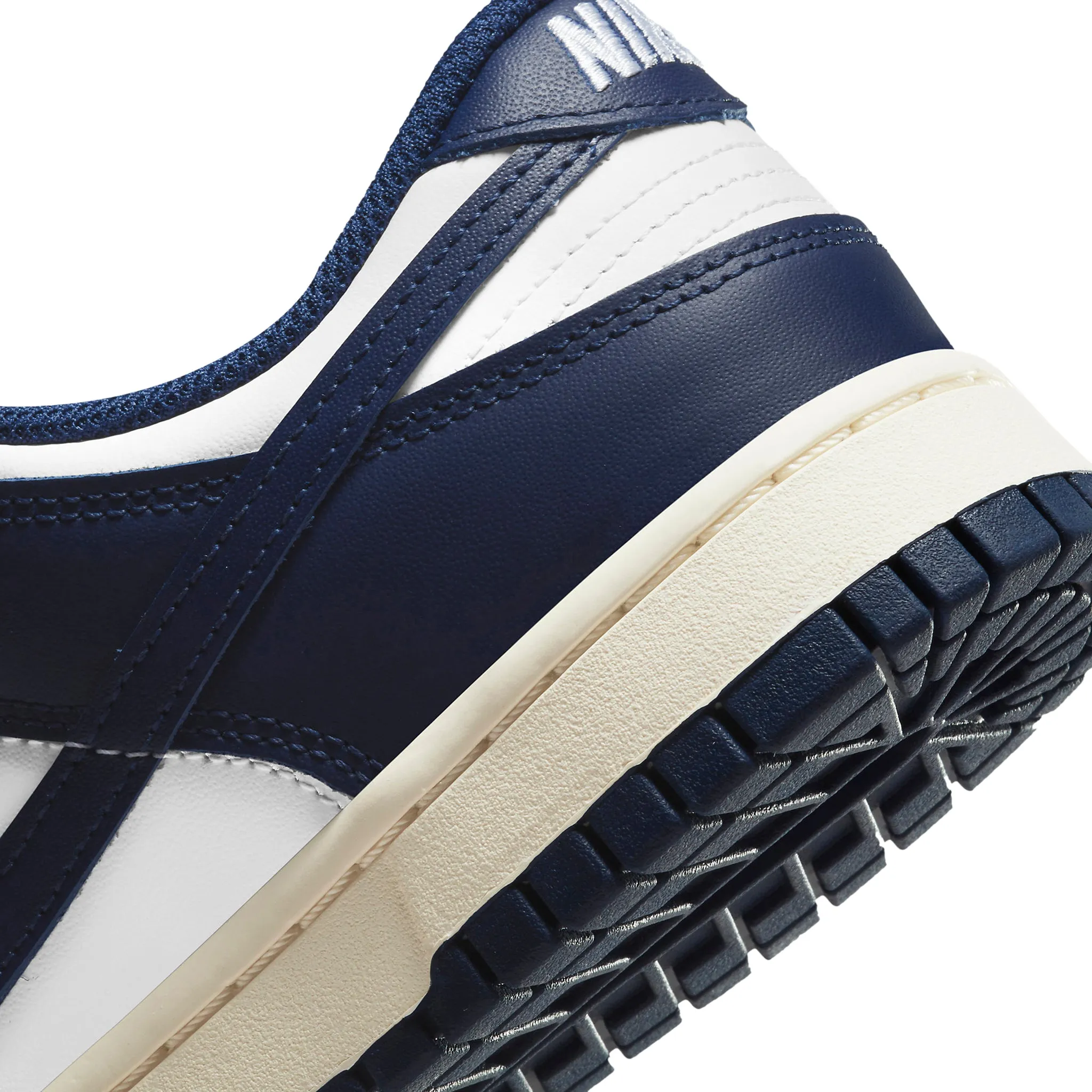 Google-friendly result: Vintage Navy Nike Dunk Low Women's Shoes