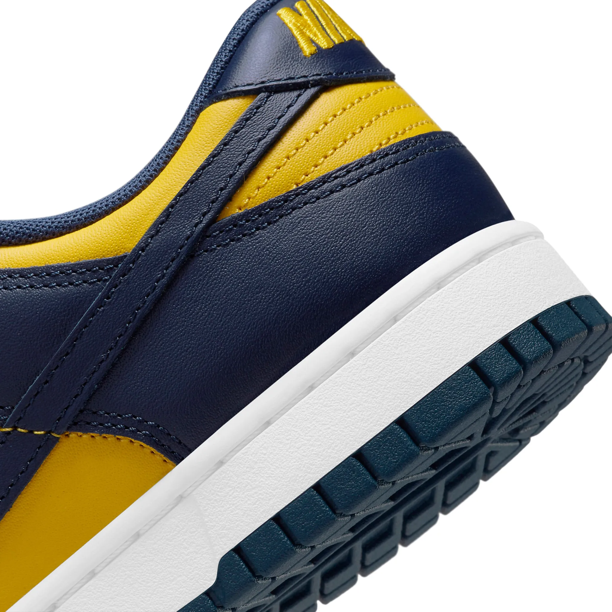 Nike Dunk Low Michigan 2021 sneakers.