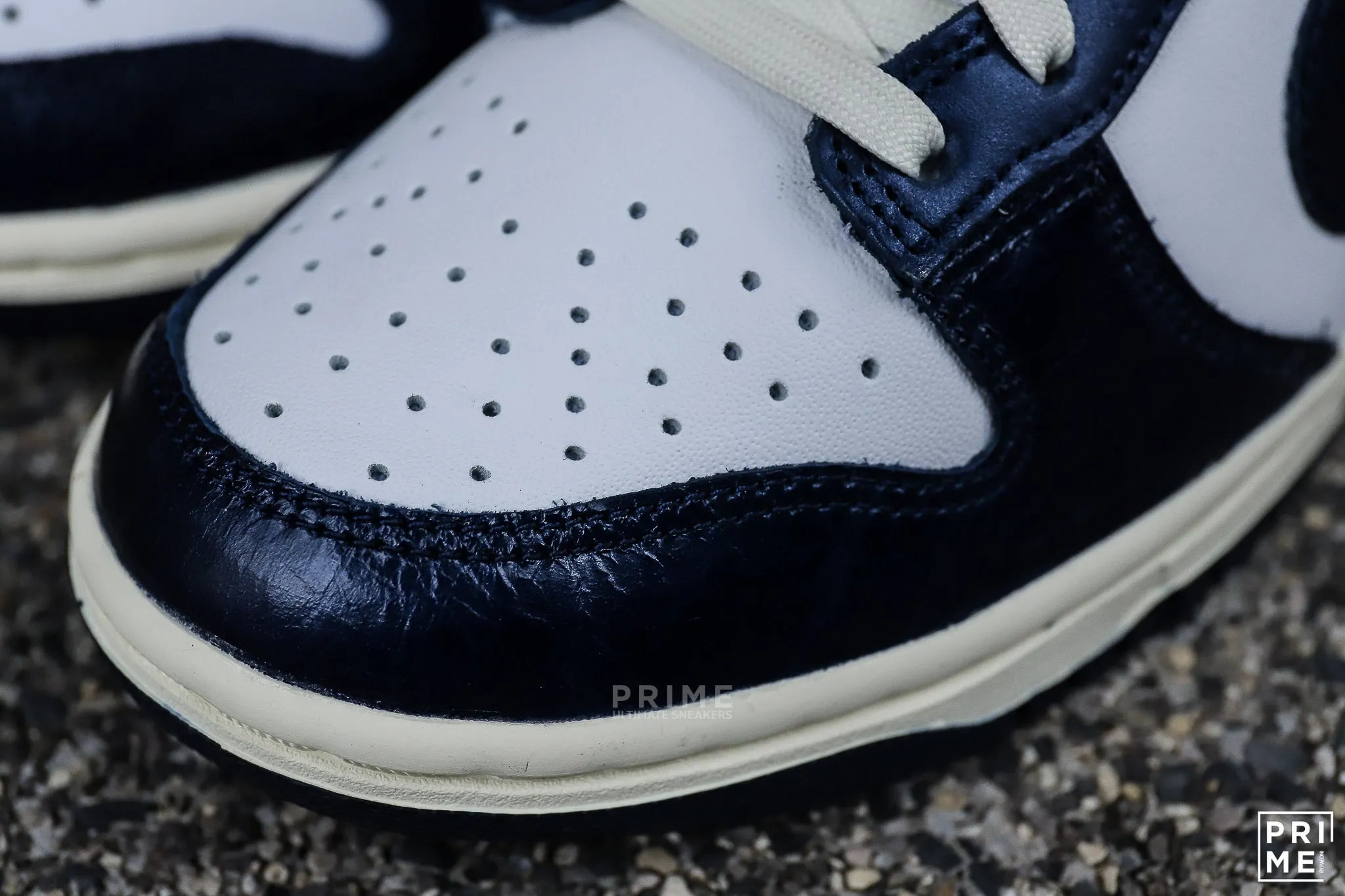 Nike Dunk Low W PRM Vintage Navy is a popular sneaker. (FN7197 100)