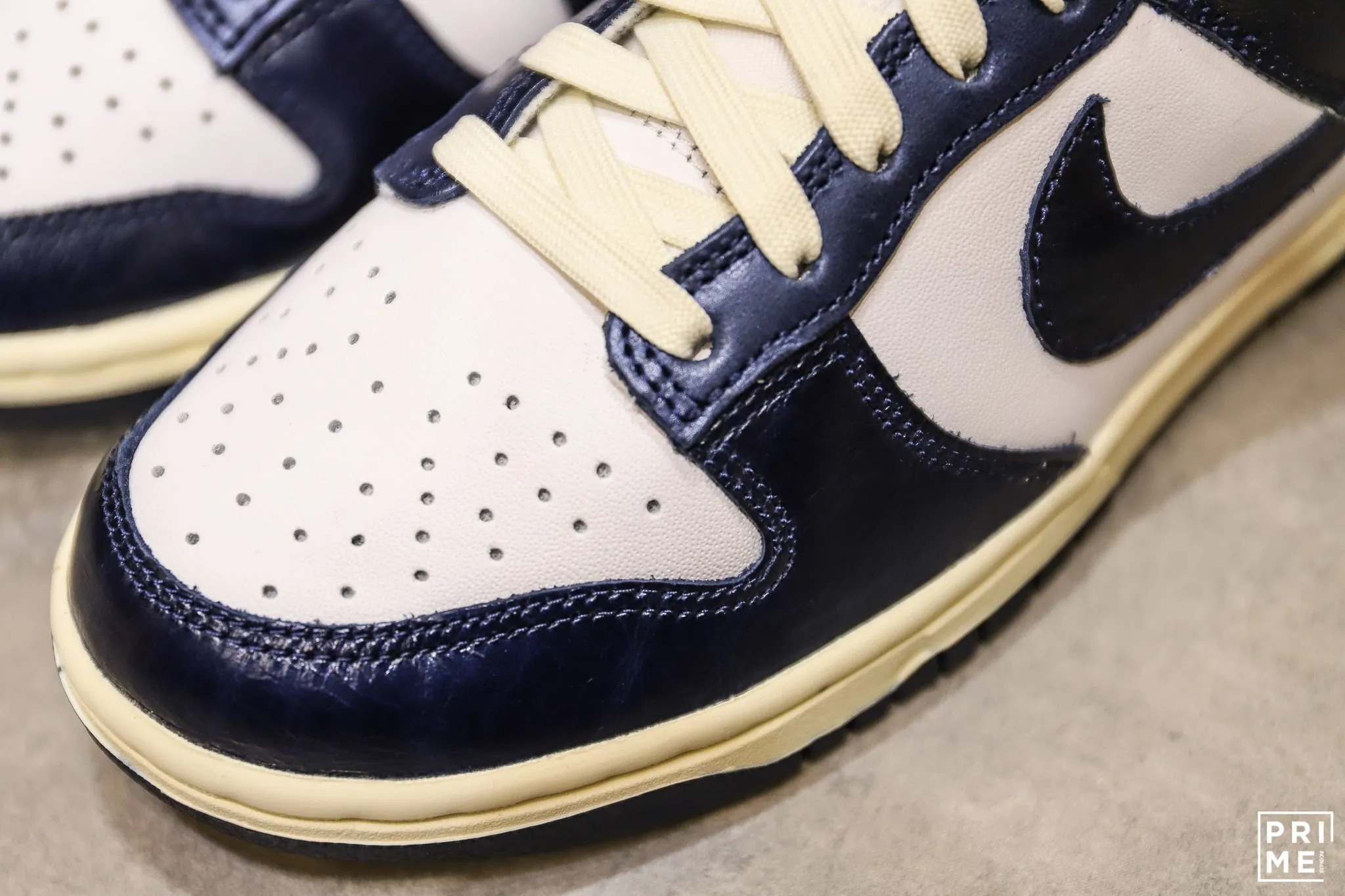 Nike Dunk Low W PRM Vintage Navy is a popular sneaker. (FN7197 100)