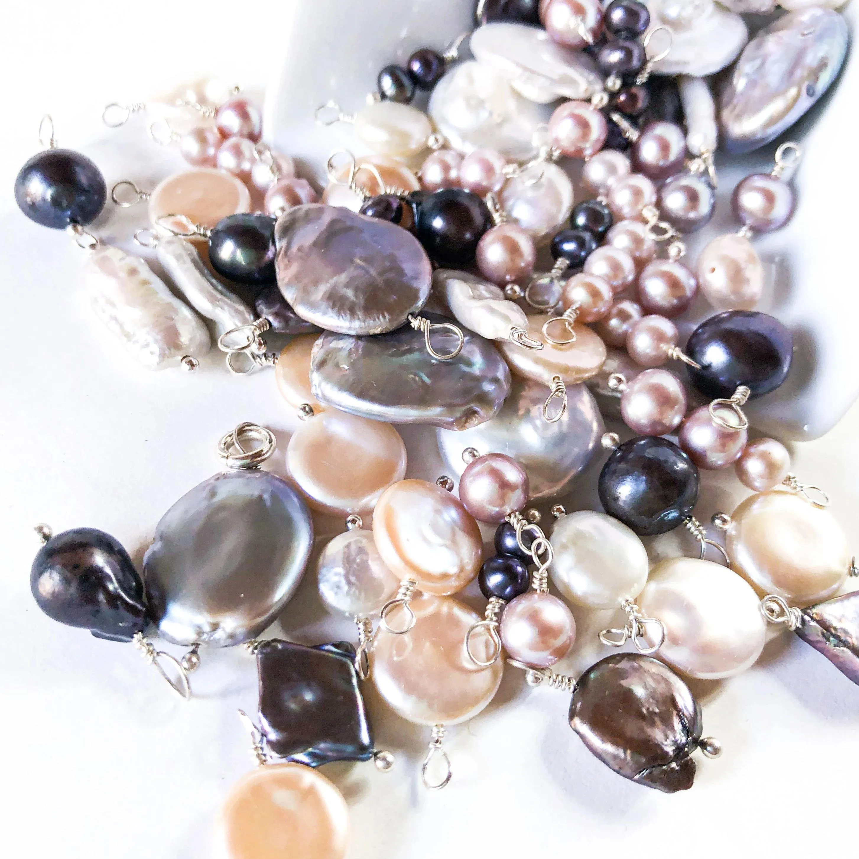 Pearl - precious gemstone with lustrous appearance, colors, and sizes for jewelry