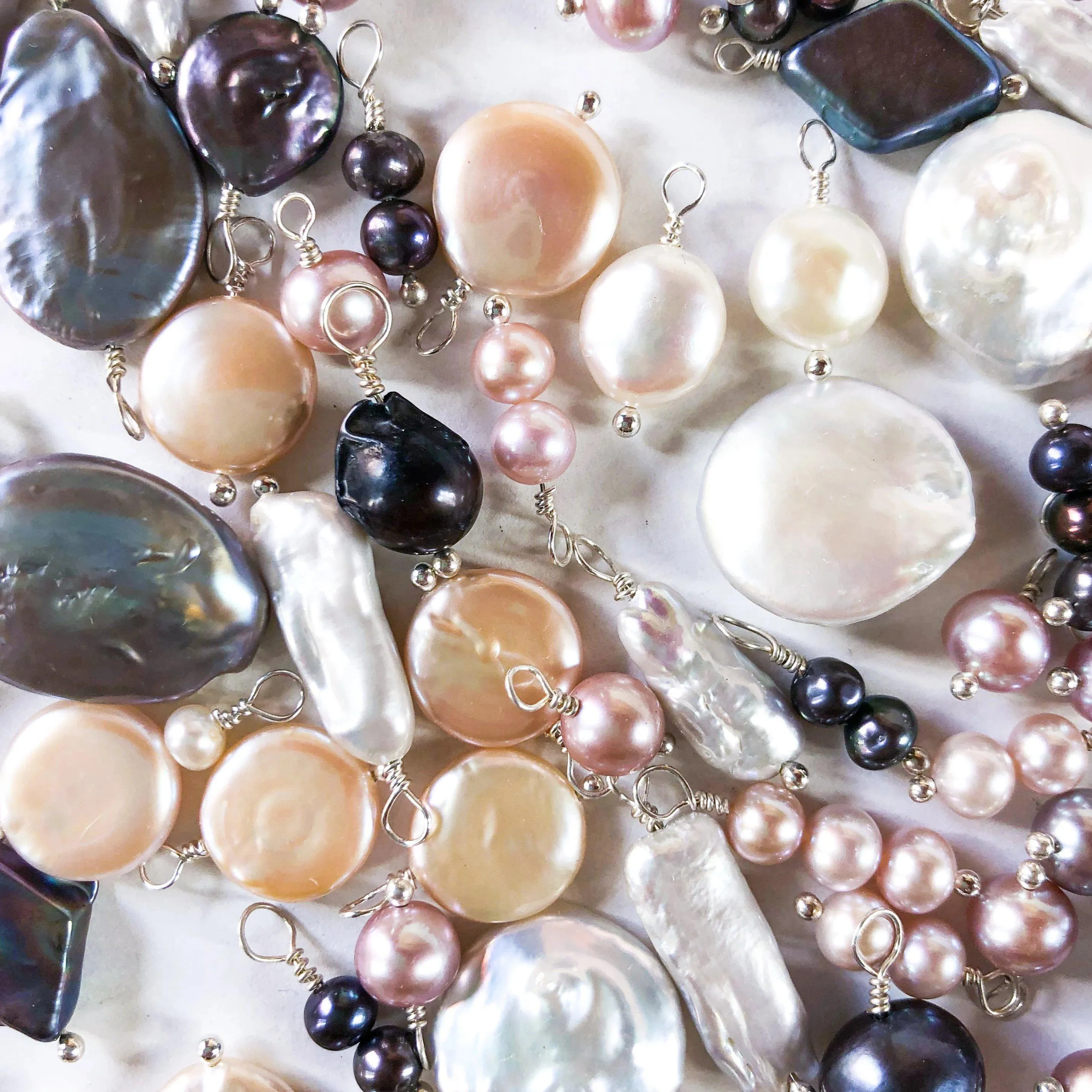 Pearl - precious gemstone with lustrous appearance, colors, and sizes for jewelry