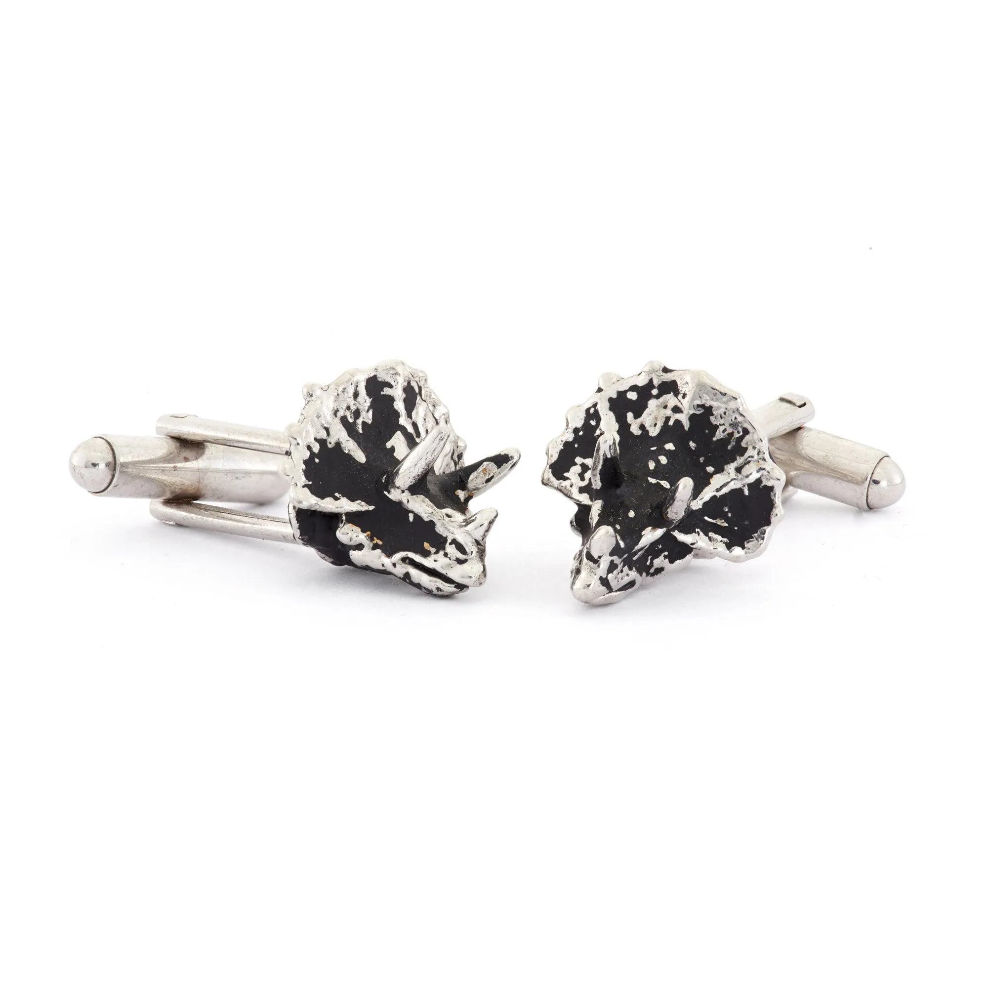 Triceratops cufflinks.