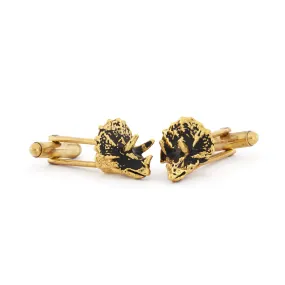 Triceratops cufflinks.