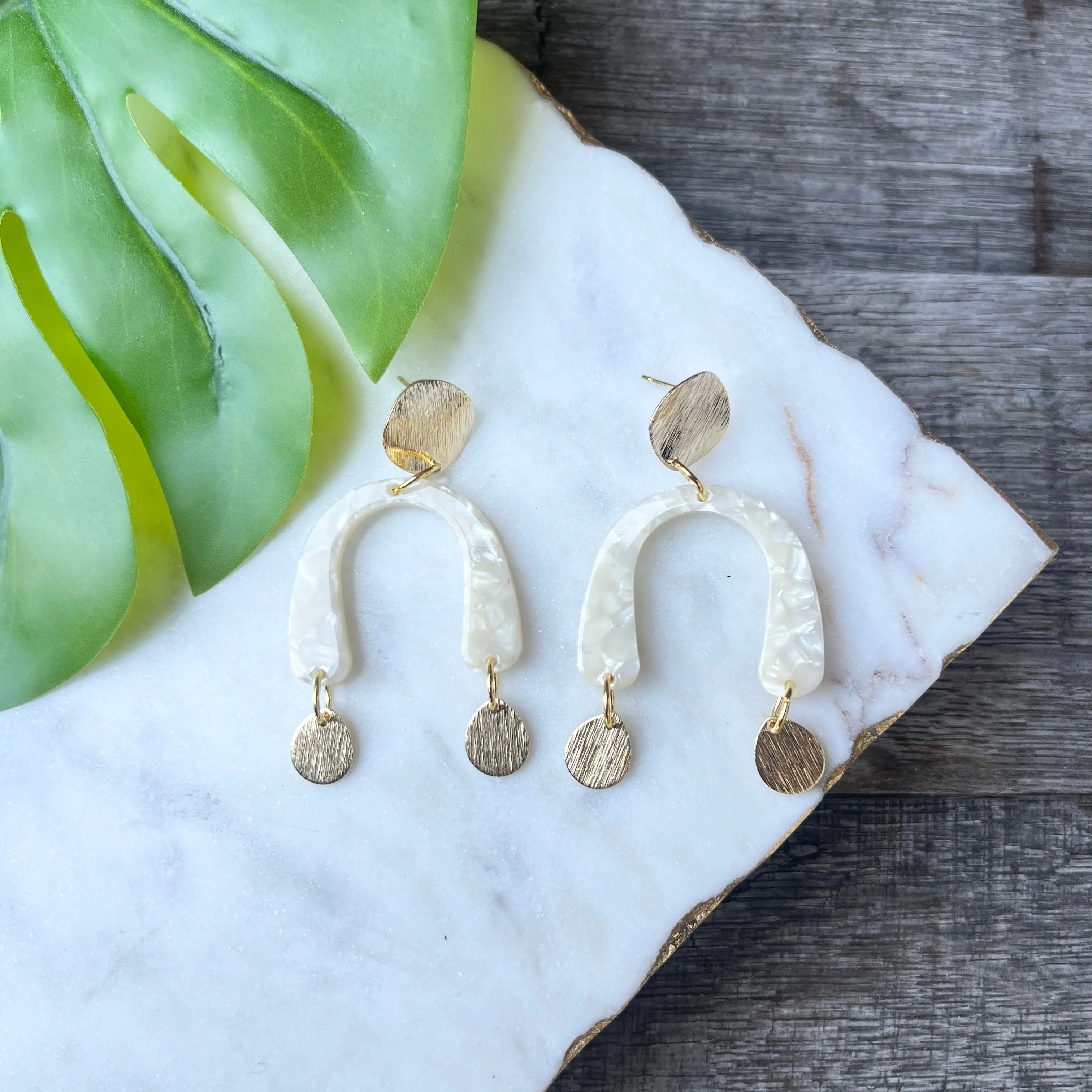 White Pearl Horseshoe Drops - Results: A stunning collection of white pearl horseshoe earrings. Find the perfect pair of drops f